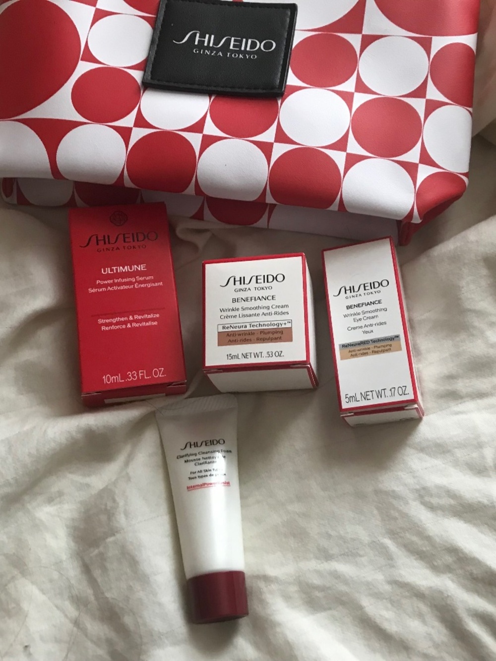 Shiseido 4 piece skincare sample kit with bag